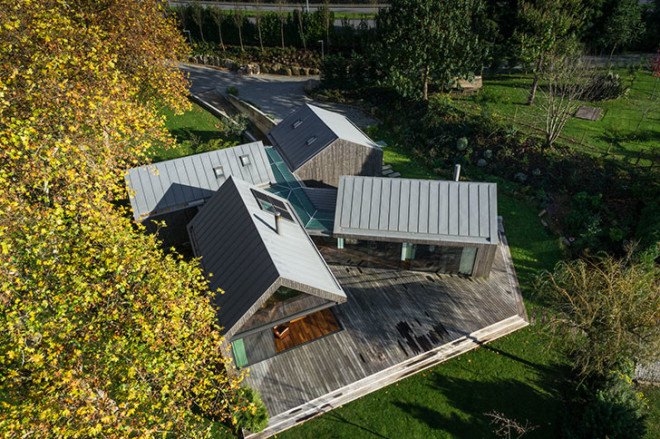 PROD Arquitectura, Portugal, House of Four Houses, green architecture, pitched roof, vernacular architecture, natural light, mezzanine, deck terrace, mobile partitions, glass-to-ceiling windows