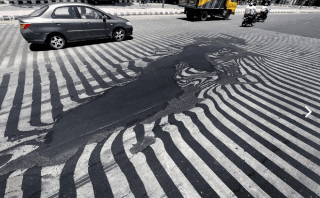 india, heat wave, heatwave, climate change, deaths from heat stroke, melting streets, melting asphalt, india heat 2015