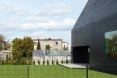 House in Lubliniec 2, Dyrda Fikus Architekci, sculptural architecture, dark exterior, polyurethane facade, residential architecture, family home, skylights, daylit house
