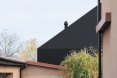 House in Lubliniec 2, Dyrda Fikus Architekci, sculptural architecture, dark exterior, polyurethane facade, residential architecture, family home, skylights, daylit house