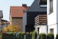 House in Lubliniec 2, Dyrda Fikus Architekci, sculptural architecture, dark exterior, polyurethane facade, residential architecture, family home, skylights, daylit house