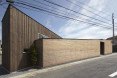 N House, N House by Roote, Roote, difficult terrain, difficult site, challenging plot of land, challenging site, timber clad architecture, timber, floor to ceiling glass doors, outdoor patio, children’s play space, Fukuoka, Japanese architecture,
