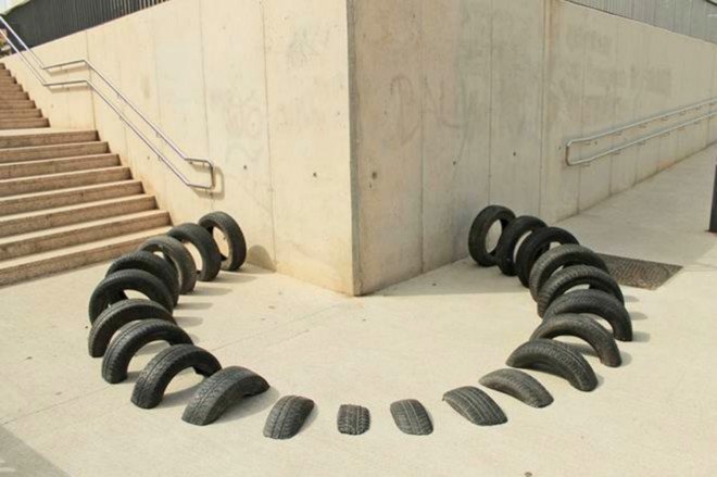 Pneumàtic, reused tires, salvaged tires, artwork, barcelona, barcelona art installation, OOSS, Iago Buceta, and Mateu Targa, Ús Barcelona, urban art, street festivals, barcelona street art, repurposed tires, tire art,
