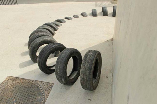 Pneumàtic, reused tires, salvaged tires, artwork, barcelona, barcelona art installation, OOSS, Iago Buceta, and Mateu Targa, Ús Barcelona, urban art, street festivals, barcelona street art, repurposed tires, tire art,
