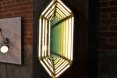 Rosie Li, lighting designer, Brooklyn lighting designer, ICFF, International Contemporary Furniture Fair, NY Design Week, New York Design Week, Rosie Li Studio, hexagonal mirror light, green lighting, artistic lighting, sculptural lighting