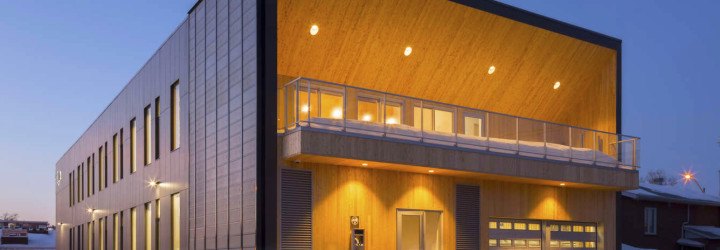 STGM Architects, headquarters, Quebec, Canada, office space, natural lighting, water management, energy-efficient building, wooden facade, timber facade, solar wall, green architecture, prefab building, open-plan office, LED lights