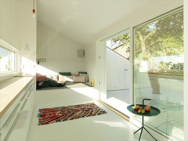 The Slice, Saunders Architecture, Todd Saunders, Norway, Scandinavian design, Canadian architect, tiny home, tiny cabin, minimalist, monochrome, backyard studio, deck, triangular building, triangle, guest house,