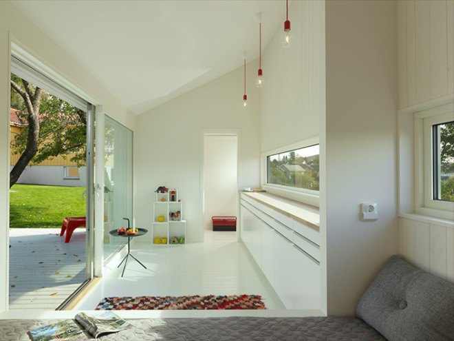 The Slice, Saunders Architecture, Todd Saunders, Norway, Scandinavian design, Canadian architect, tiny home, tiny cabin, minimalist, monochrome, backyard studio, deck, triangular building, triangle, guest house,