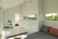 The Slice, Saunders Architecture, Todd Saunders, Norway, Scandinavian design, Canadian architect, tiny home, tiny cabin, minimalist, monochrome, backyard studio, deck, triangular building, triangle, guest house,