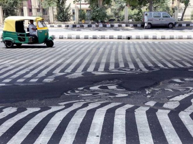 india, heat wave, heatwave, climate change, deaths from heat stroke, melting streets, melting asphalt, india heat 2015