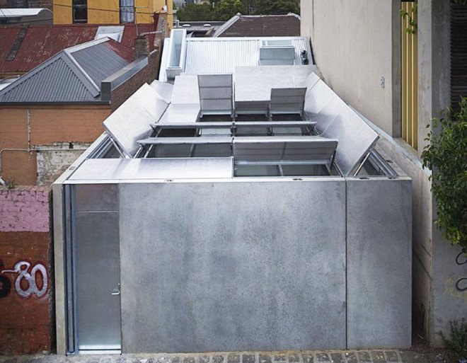 green house, Sean Godsell Architects, melbourne, australia, green renovation, automated sunscreen, aluminum screens, metal screens, aluminium, timber cottage, natural light , skylights, cathedral ceiling, inner courtyard