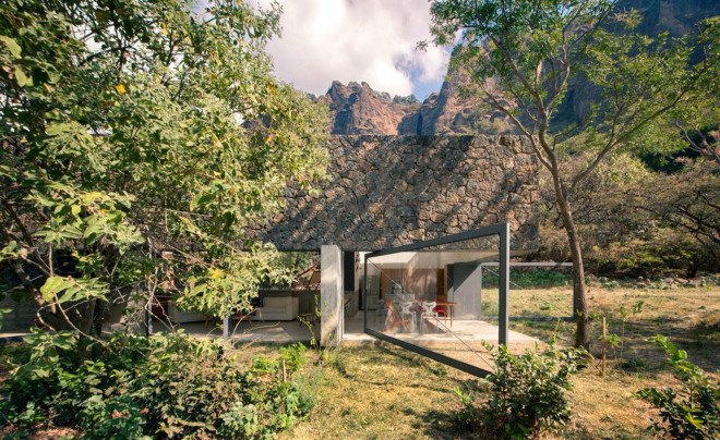 EDAA Architects, Casa Meztitla, Mexico, mountain house, holiday home, retirement home, volcanic stone, pivoting doors, glass facade, rainwater collection, green architecture
