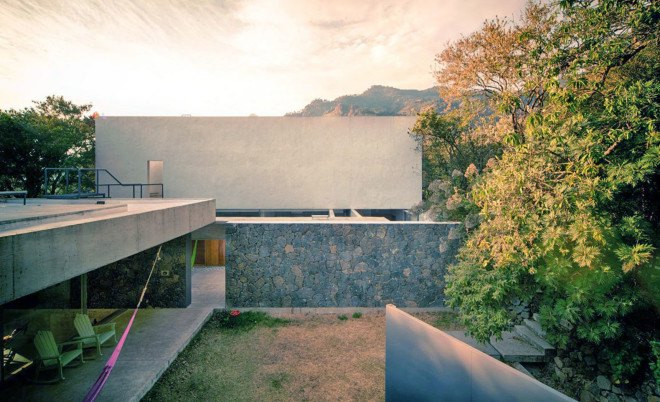 EDAA Architects, Casa Meztitla, Mexico, mountain house, holiday home, retirement home, volcanic stone, pivoting doors, glass facade, rainwater collection, green architecture