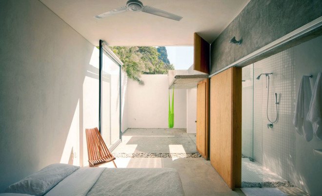 EDAA Architects, Casa Meztitla, Mexico, mountain house, holiday home, retirement home, volcanic stone, pivoting doors, glass facade, rainwater collection, green architecture
