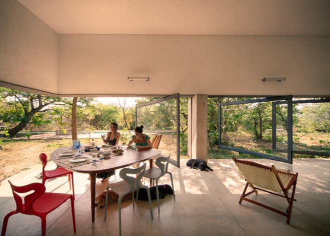 EDAA Architects, Casa Meztitla, Mexico, mountain house, holiday home, retirement home, volcanic stone, pivoting doors, glass facade, rainwater collection, green architecture