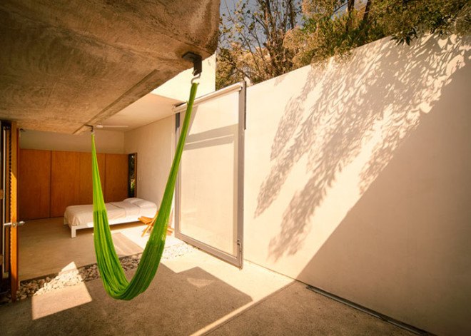 EDAA Architects, Casa Meztitla, Mexico, mountain house, holiday home, retirement home, volcanic stone, pivoting doors, glass facade, rainwater collection, green architecture