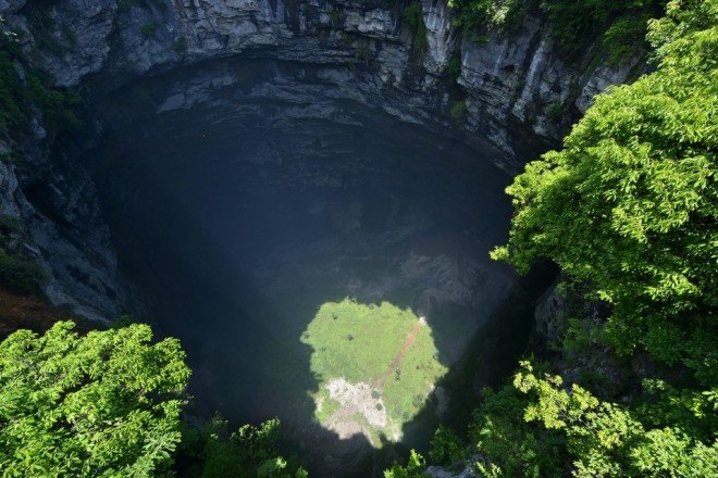 sinkhole, China sinkhole, Hubei sinkhole, karst landscape, karst, karst topography, limestone, Hubei, Xuanen county, limestone cavity, ecosystem, swallows, ferns,