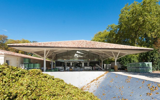 Foster + Partners, Château Margaux winery, winery, France, green renovation, natural light, pitched roof, vernacular architecture, green architecture, wine cellar
