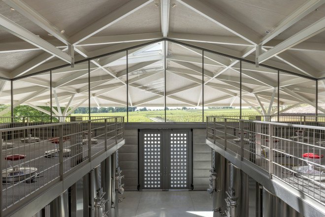 Foster + Partners, Château Margaux winery, winery, France, green renovation, natural light, pitched roof, vernacular architecture, green architecture, wine cellar