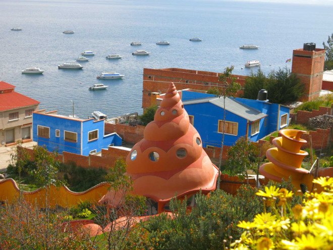 Martin Stratker, Las Olas, fairy tale accomodation, Bolivian hotel, Copacabana, Bolivia, local builders, German sculptor, animal shaped building, snail building, Ana Lisa Alperovich