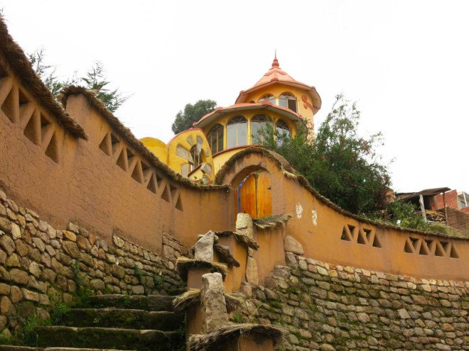 Martin Stratker, Las Olas, fairy tale accomodation, Bolivian hotel, Copacabana, Bolivia, local builders, German sculptor, animal shaped building, snail building, Ana Lisa Alperovich