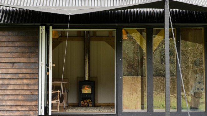 composting toilet, Out of the Valley cabin, Shou Sugi Ban, charred timber, corrugated roof, National Trust woodland, River Teign, handcrafted furniture, solar panels, solar powered cabin, off grid cabin, Rupert McKelvie