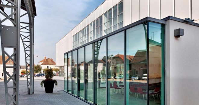 green design, eco design, sustainable design, Auneau Cultural Center, Architecture Patrick Mauger, glass curtain, pitched roof, cultural center, glass facade, solar panels
