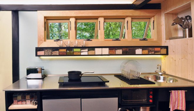 Toybox tiny home, tiny house, tiny home, toybox home, modern tiny home, LED, transforming furniture, spacesaving design, blown in blanket insulation, radiant floor heating,