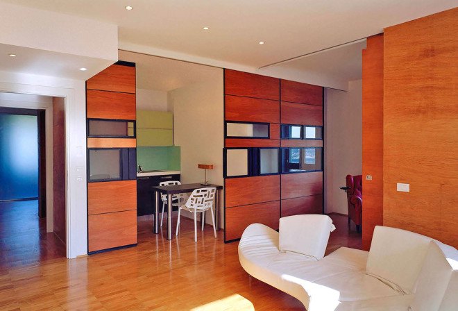 Officina Leonardo, Rome, Italy, green renovation, apartment transformation, wood siding, wood cladding, sliding doors, natural light, twin flats, mosaic floors, parquet floor