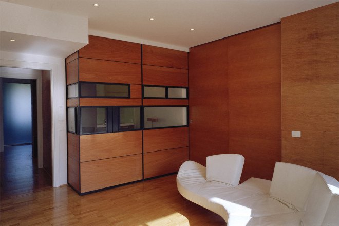 Officina Leonardo, Rome, Italy, green renovation, apartment transformation, wood siding, wood cladding, sliding doors, natural light, twin flats, mosaic floors, parquet floor