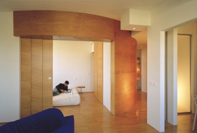 Officina Leonardo, Rome, Italy, green renovation, apartment transformation, wood siding, wood cladding, sliding doors, natural light, twin flats, mosaic floors, parquet floor