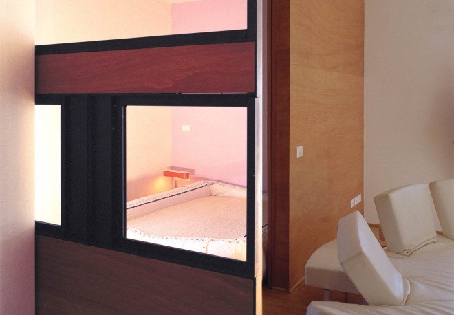 Officina Leonardo, Rome, Italy, green renovation, apartment transformation, wood siding, wood cladding, sliding doors, natural light, twin flats, mosaic floors, parquet floor