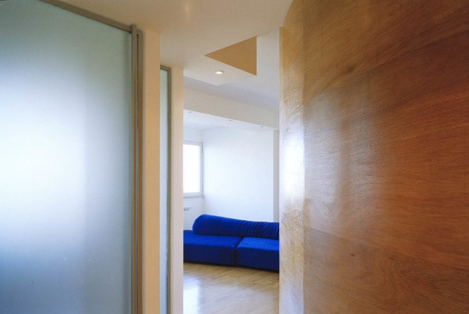 Officina Leonardo, Rome, Italy, green renovation, apartment transformation, wood siding, wood cladding, sliding doors, natural light, twin flats, mosaic floors, parquet floor