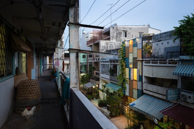 block architects, vegan house, vietnam architecture, shutter house, colorful shutters, quang tran photography, tube houses, jalousie windows, daylighting