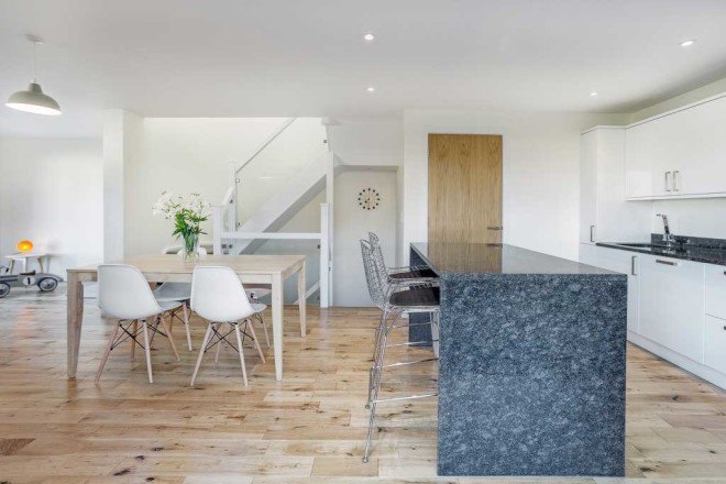 Adam Knibb, twin wooden homes, Cedar Lodges, Winchester, floating homes, cedar clad, window-less,