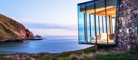 Annandale Seascape Cottage, Pattersons, New Zealand, green retreat, green cottage, rainwater harvesting, reforestation, earthquake-resistant home, glass facade, seaside home