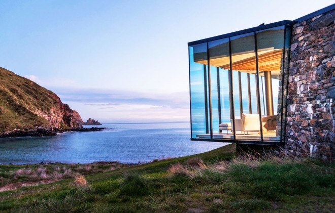 Annandale Seascape Cottage, Pattersons, New Zealand, green retreat, green cottage, rainwater harvesting, reforestation, earthquake-resistant home, glass facade, seaside home