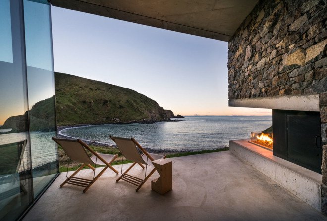 Annandale Seascape Cottage, Pattersons, New Zealand, green retreat, green cottage, rainwater harvesting, reforestation, earthquake-resistant home, glass facade, seaside home