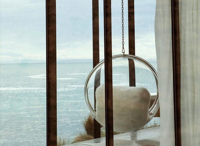 Annandale Seascape Cottage, Pattersons, New Zealand, green retreat, green cottage, rainwater harvesting, reforestation, earthquake-resistant home, glass facade, seaside home