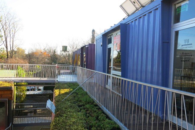 BZZ Arquitectura, shipping container mall, QUO Container Center, Cecilia Bertezzolo, EcoSan, Ingeniero Maschwitz, colorful containers, sustaimable shopping center, Buenos Aires, stacked shipping containers