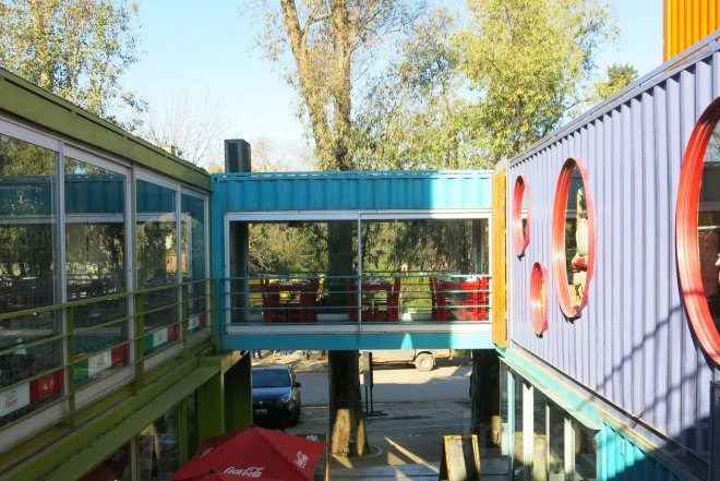 BZZ Arquitectura, shipping container mall, QUO Container Center, Cecilia Bertezzolo, EcoSan, Ingeniero Maschwitz, colorful containers, sustaimable shopping center, Buenos Aires, stacked shipping containers