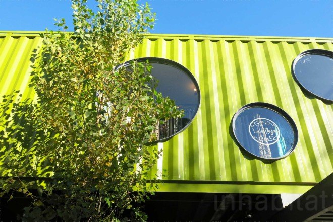 BZZ Arquitectura, shipping container mall, QUO Container Center, Cecilia Bertezzolo, EcoSan, Ingeniero Maschwitz, colorful containers, sustaimable shopping center, Buenos Aires, stacked shipping containers