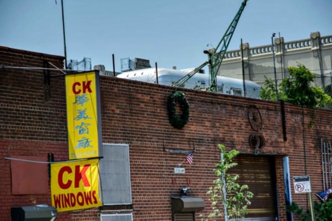 Camping Trailer, Red Hook, rooftop homes, nyc rooftop houses, trailer on the roof, nyc trailer, green roof, green design, nyc buildings, Streamline trailer nyc roof, nyc Streamline, Department of Buildings, tiny homes, minimalist living,