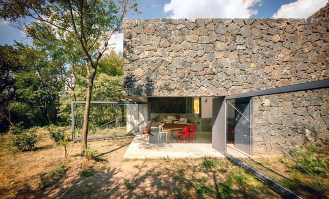 EDAA Architects, Casa Meztitla, Mexico, mountain house, holiday home, retirement home, volcanic stone, pivoting doors, glass facade, rainwater collection, green architecture