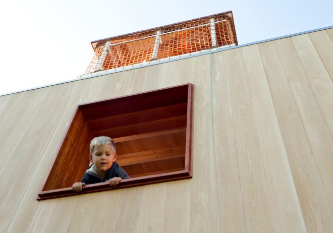 modern treehouse, sharon davis, elizabeth felicella, garrison new york treehouse, modern outdoor playhouse, treehouse with slides, treehouse with fire pole, treehouse with climbing net, treehouse playhouse, luxury treehouse