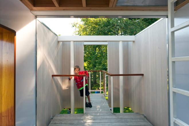 modern treehouse, sharon davis, elizabeth felicella, garrison new york treehouse, modern outdoor playhouse, treehouse with slides, treehouse with fire pole, treehouse with climbing net, treehouse playhouse, luxury treehouse