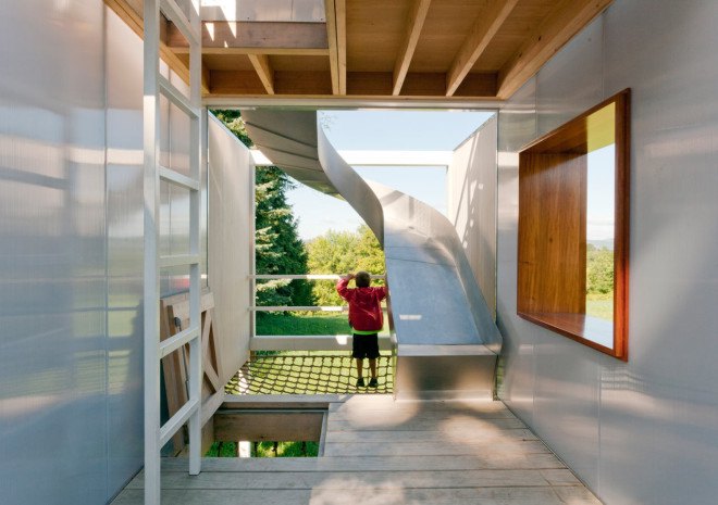 modern treehouse, sharon davis, elizabeth felicella, garrison new york treehouse, modern outdoor playhouse, treehouse with slides, treehouse with fire pole, treehouse with climbing net, treehouse playhouse, luxury treehouse