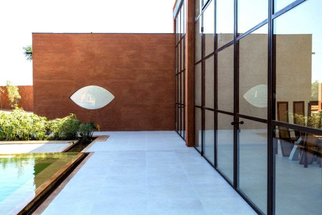 atelier koe, khamsa, senegal, clay bricks, harvested raw materials, raw building materials, solar power, wind power, wind turbine, natural pool, natural filtration system, natural freshwater pool, natural swimming pool