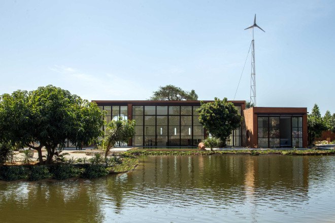 atelier koe, khamsa, senegal, clay bricks, harvested raw materials, raw building materials, solar power, wind power, wind turbine, natural pool, natural filtration system, natural freshwater pool, natural swimming pool