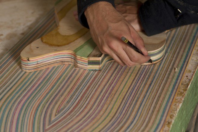 Nick Pourfard, Prisma Guitars, up cycling, reclaimed skateboards, reclaimed skateboard decks, guitars, ecofriendly company, woodworking, handmade guitars, skateboarding, guitars,